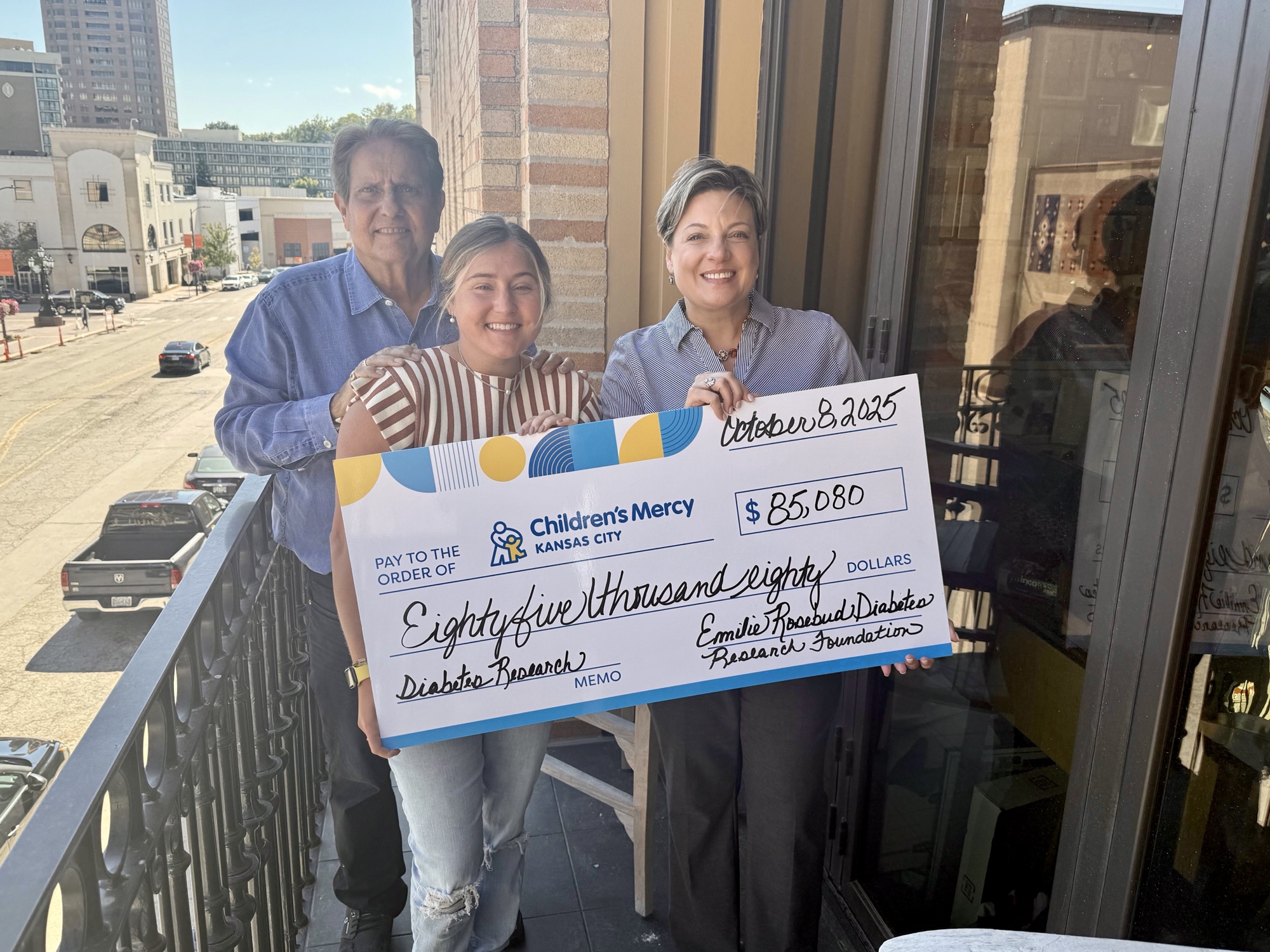 Presenting a check for $85,080 to Children’s Mercy for diabetes research